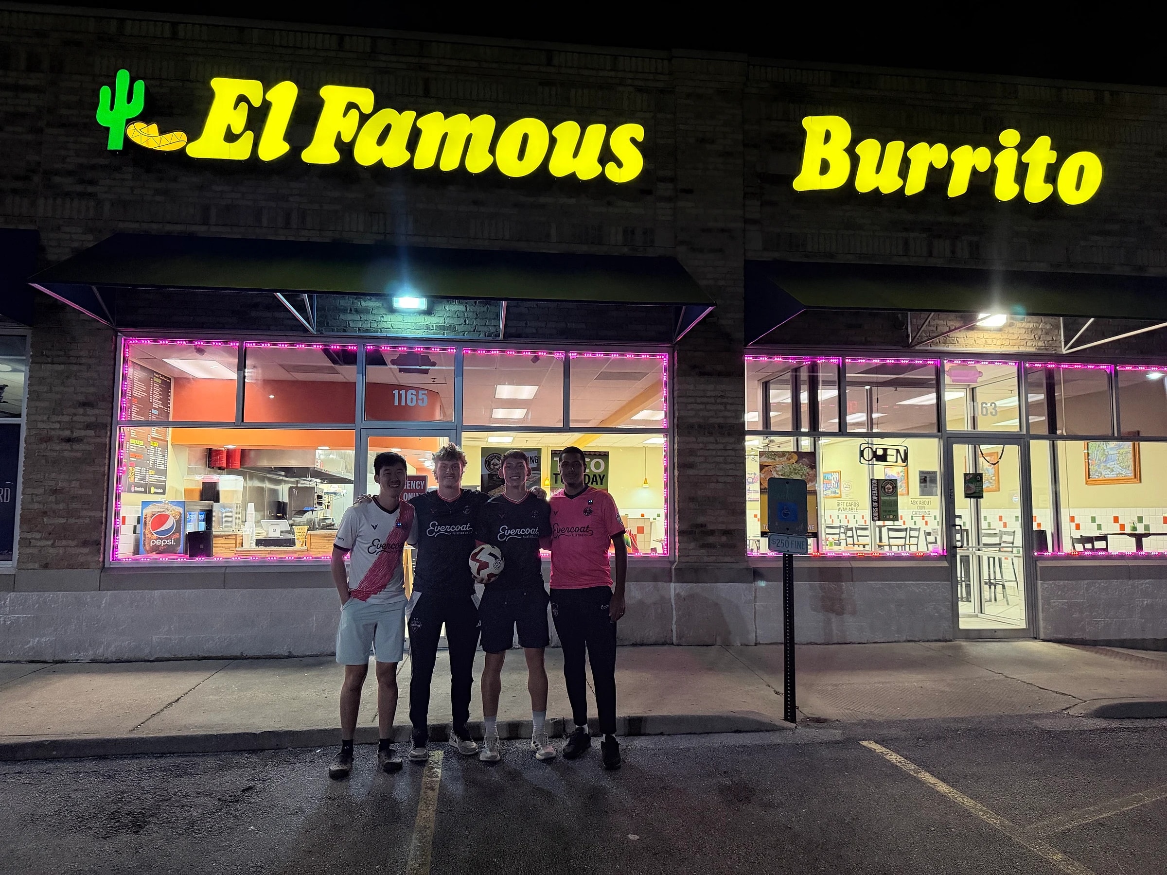 Wanderers players outside El Famous Burrito at night